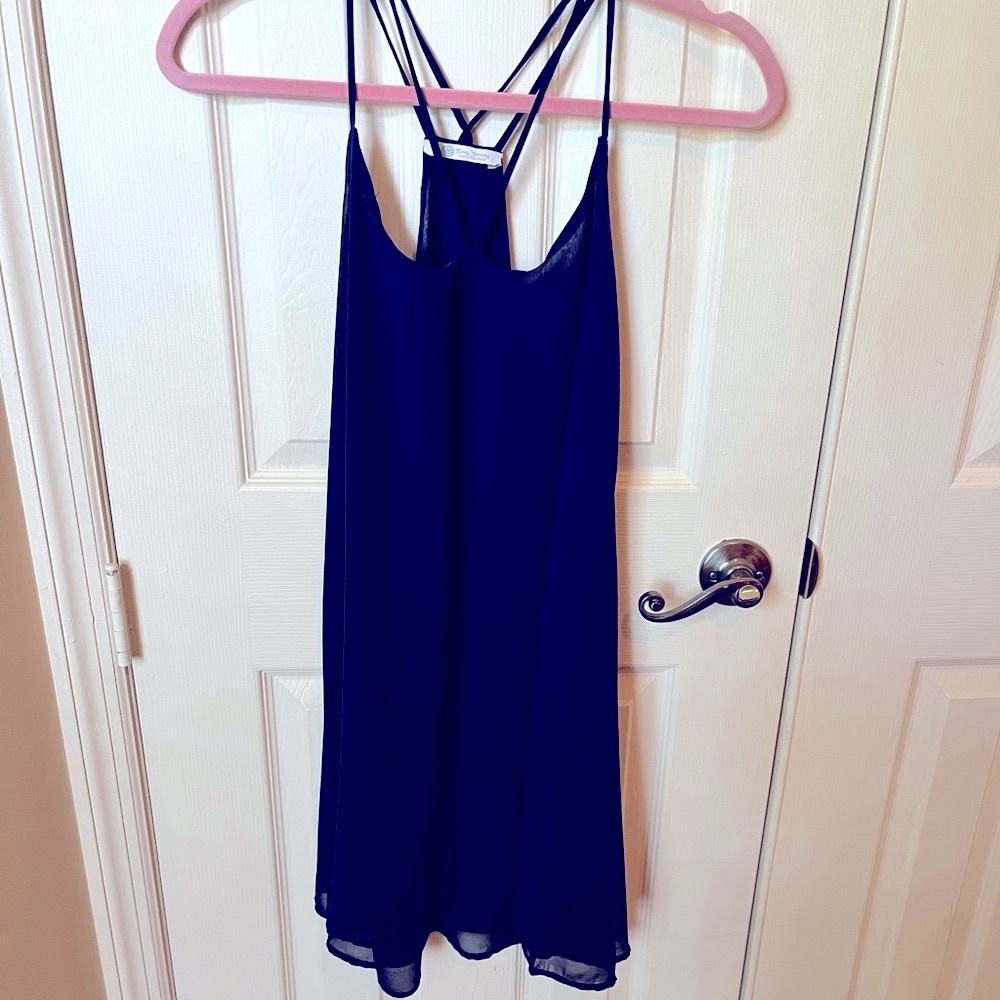 Swingy, strappy navy cami dress. Perfect for Summer. Size XS. Never worn. NWOT.
